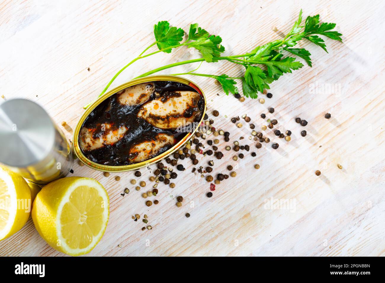 Stuffed whole squid in ink sauce Stock Photo - Alamy