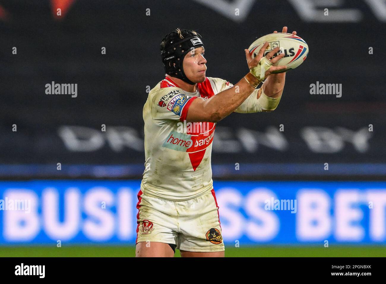 Jonny Lomax #6 of St Helens in action during the Betfred Super League Round 6 match Huddersfield Giants vs St Helens at John Smith's Stadium, Huddersfield, United Kingdom, 23rd March 2023  (Photo by Craig Thomas/News Images) Stock Photo