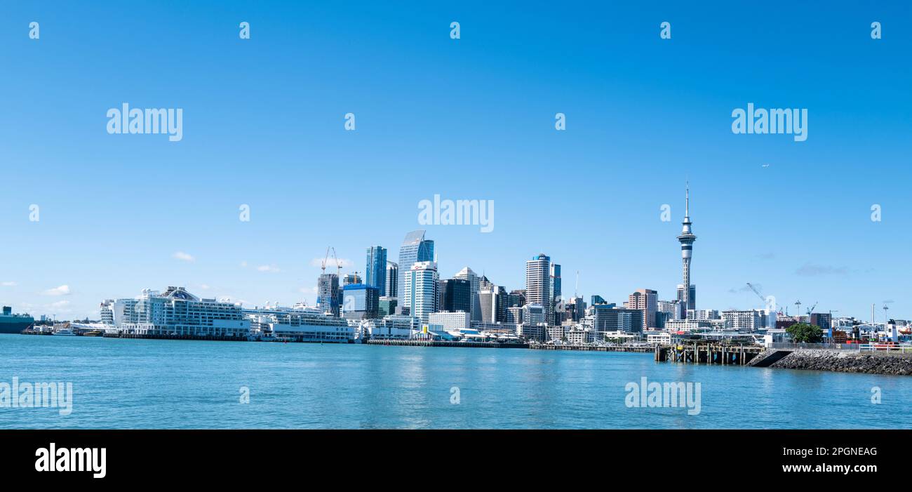 Views on board the Sealink ferry with vehicles from Auckland City center to Waiheke Island. The city center from the harbour ferry Stock Photo