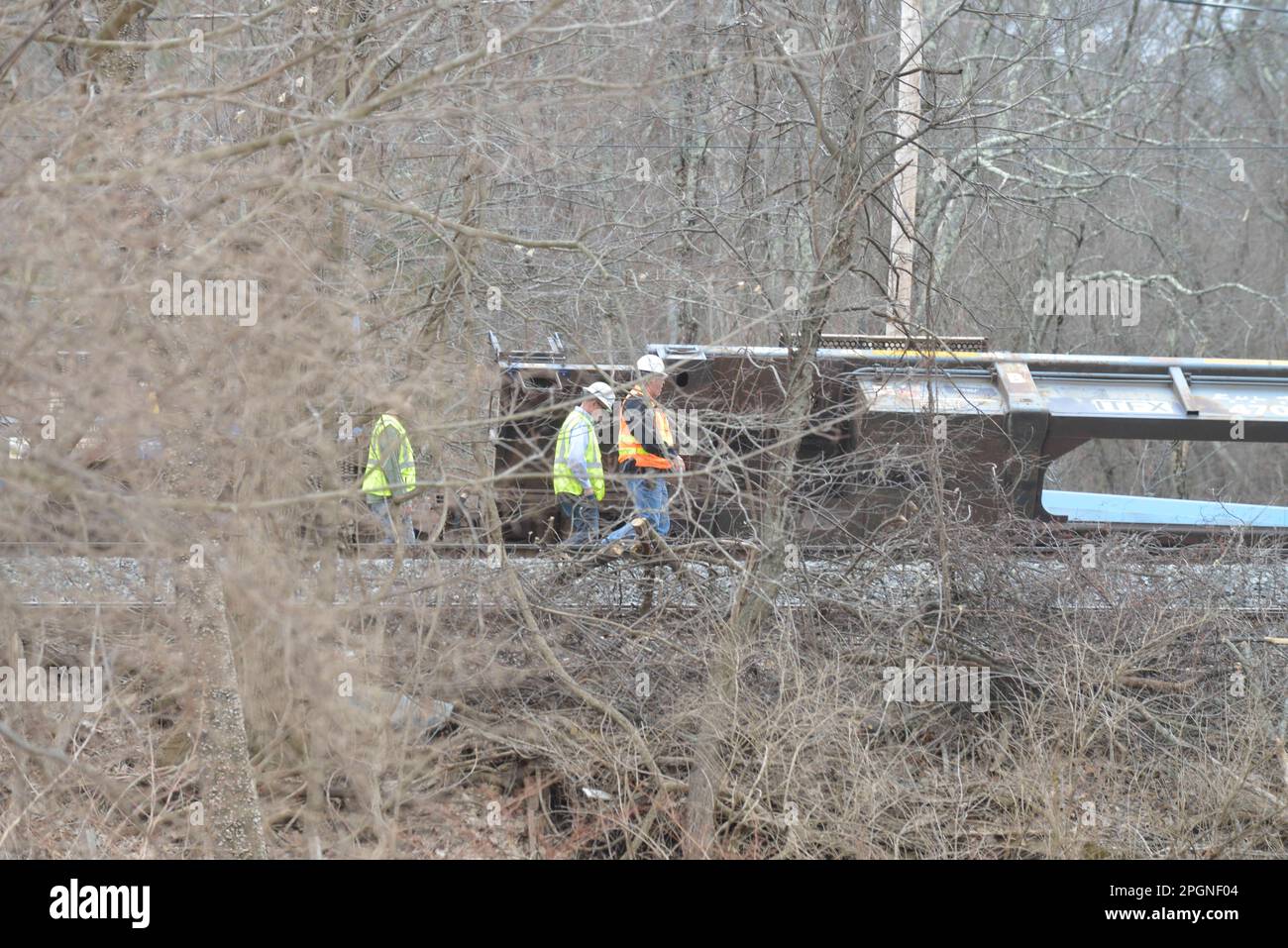 Ayer, Massachusetts, USA. 24th Mar, 2023. Derailed train cars litter