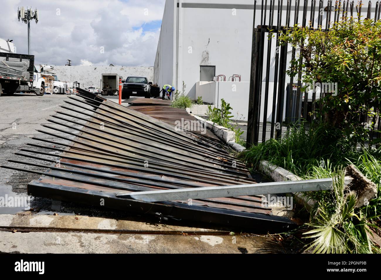 Montebello. 23rd Mar, 2023. Photo taken on March 23, 2023 shows an iron fence damaged by a tornado in the city of Montebello, Los Angeles, the United States. Los Angeles area was hit by a rare tornado on Wednesday, the strongest one to impact LA Metro area since March 1983, according to the U.S. National Weather Service (NWS). Credit: Xinhua/Alamy Live News Stock Photo