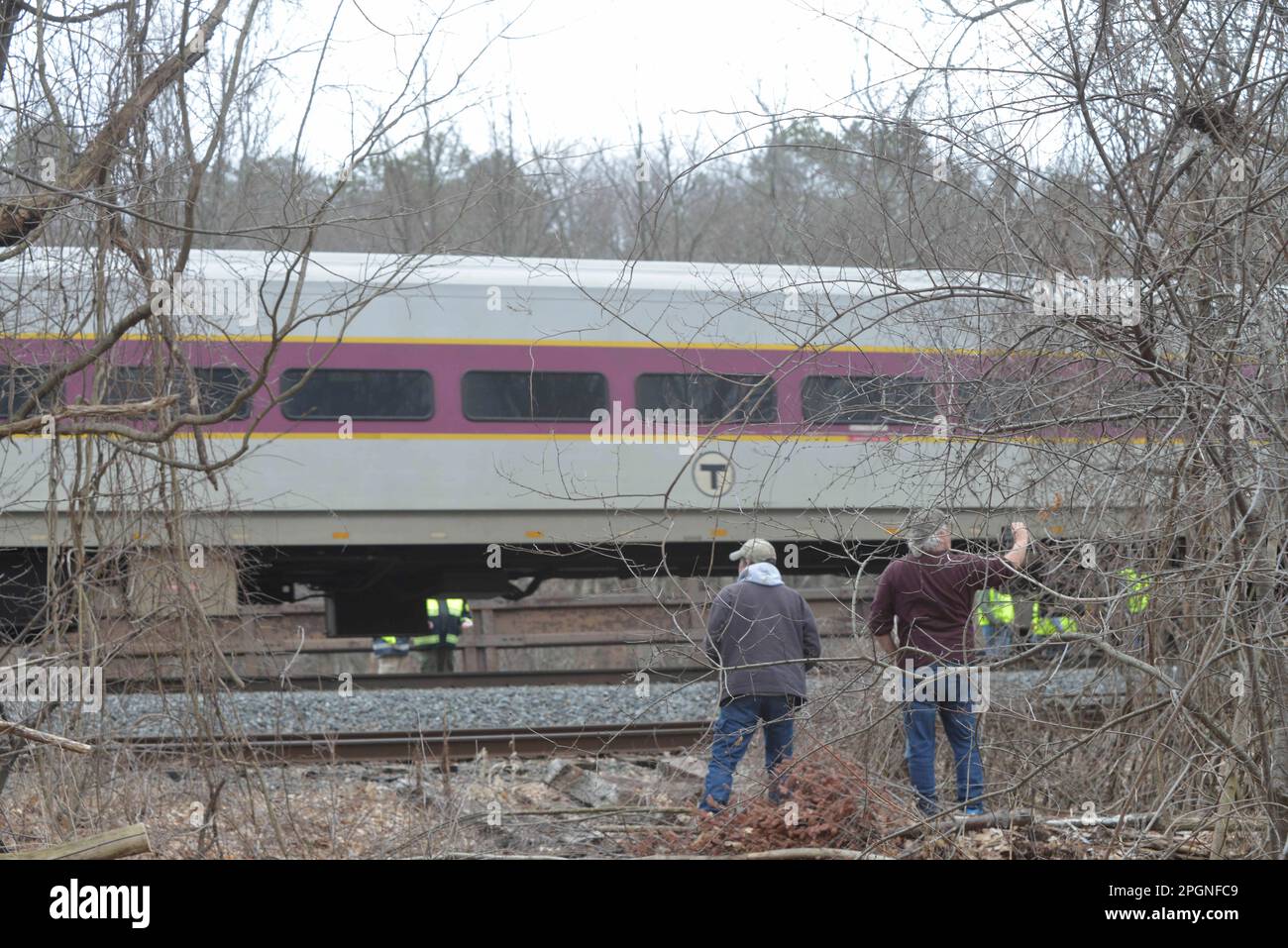Ayer, Massachusetts, USA. 24th Mar, 2023. Derailed train cars litter