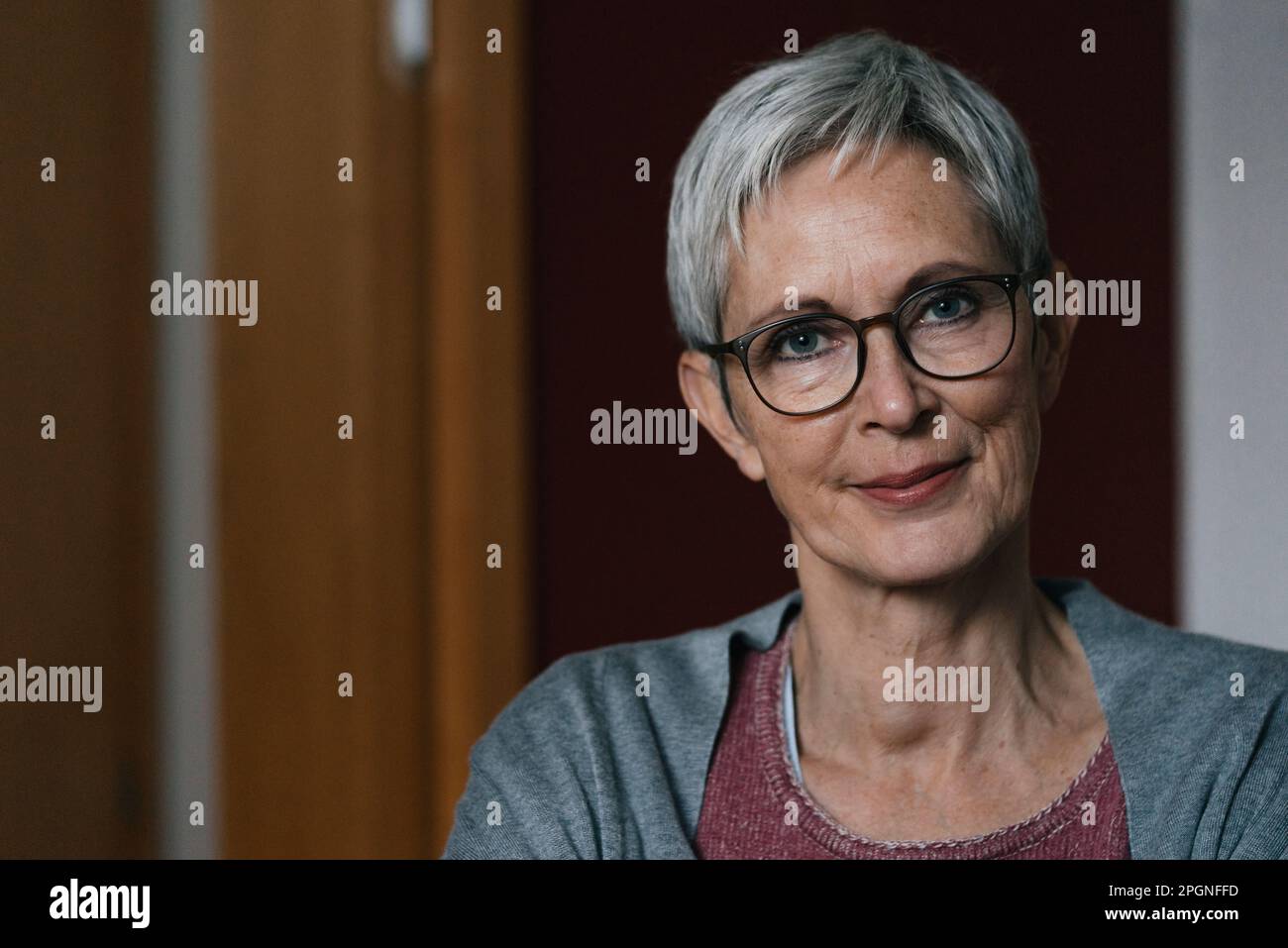 Confident mature woman at home hi-res stock photography and images - Alamy