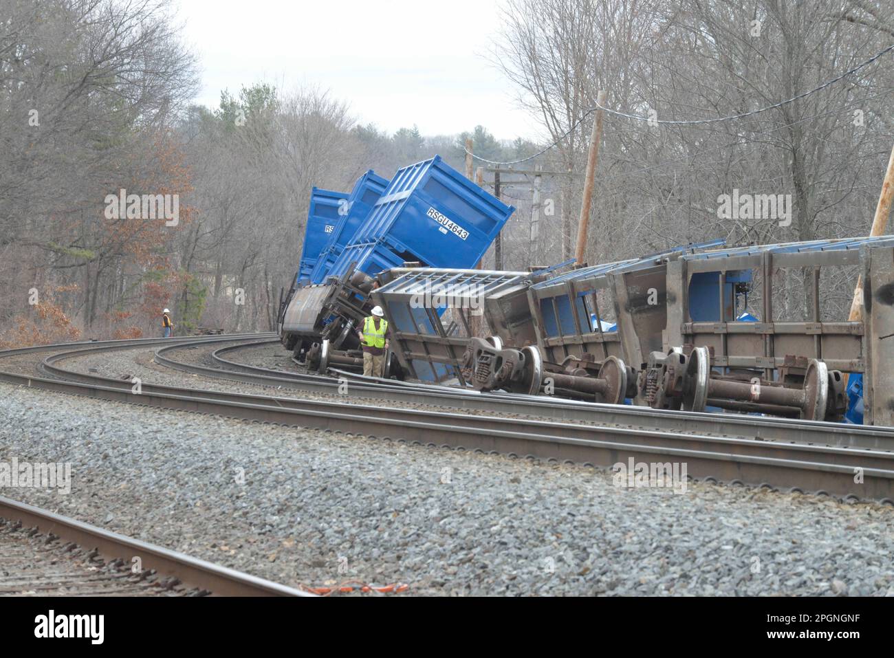 Ayer, Massachusetts, USA. 24th Mar, 2023. Derailed train cars litter