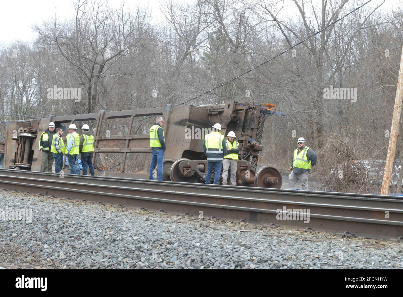 Ayer, Massachusetts, USA. 24th Mar, 2023. Derailed train cars litter