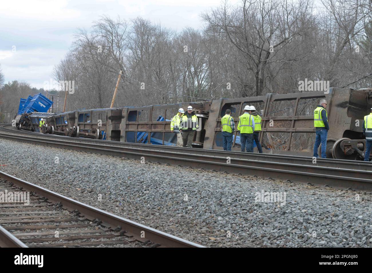 Ayer, Massachusetts, USA. 24th Mar, 2023. Derailed train cars litter