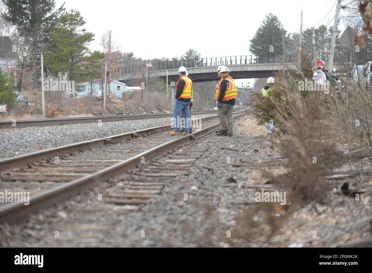 Ayer, Massachusetts, USA. 24th Mar, 2023. Derailed train cars litter