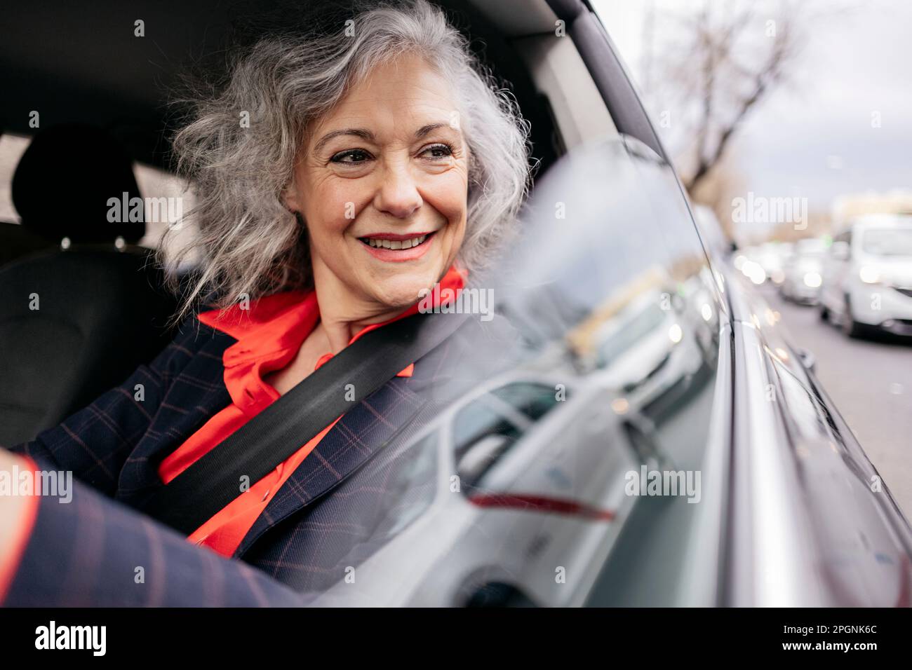 Mature businesswoman driving car hi-res stock photography and images ...