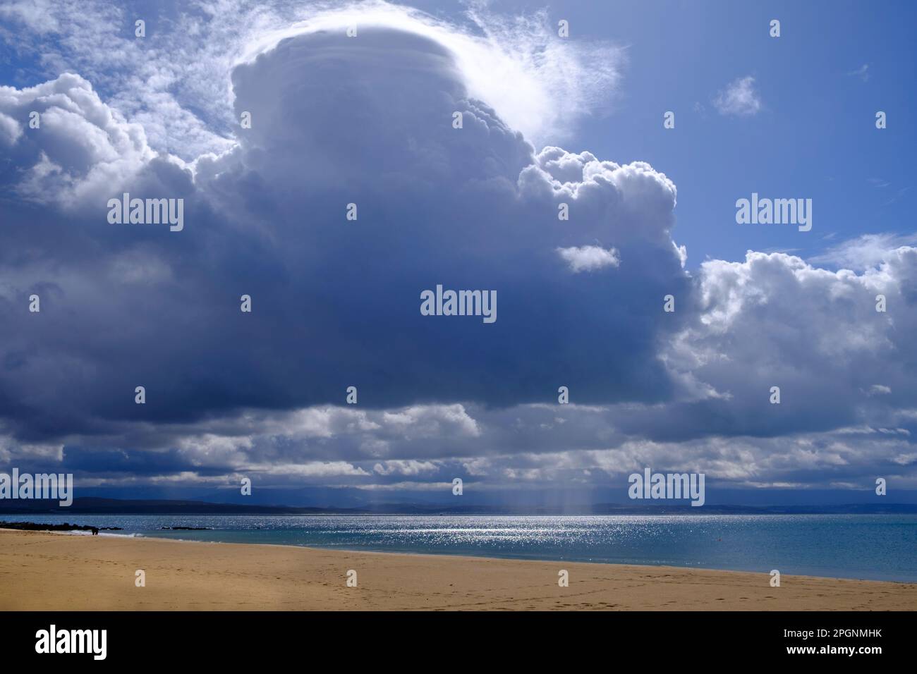 South Africa, Western Cape, Mossel Bay, Large thick clouds over Santos Beach Stock Photo