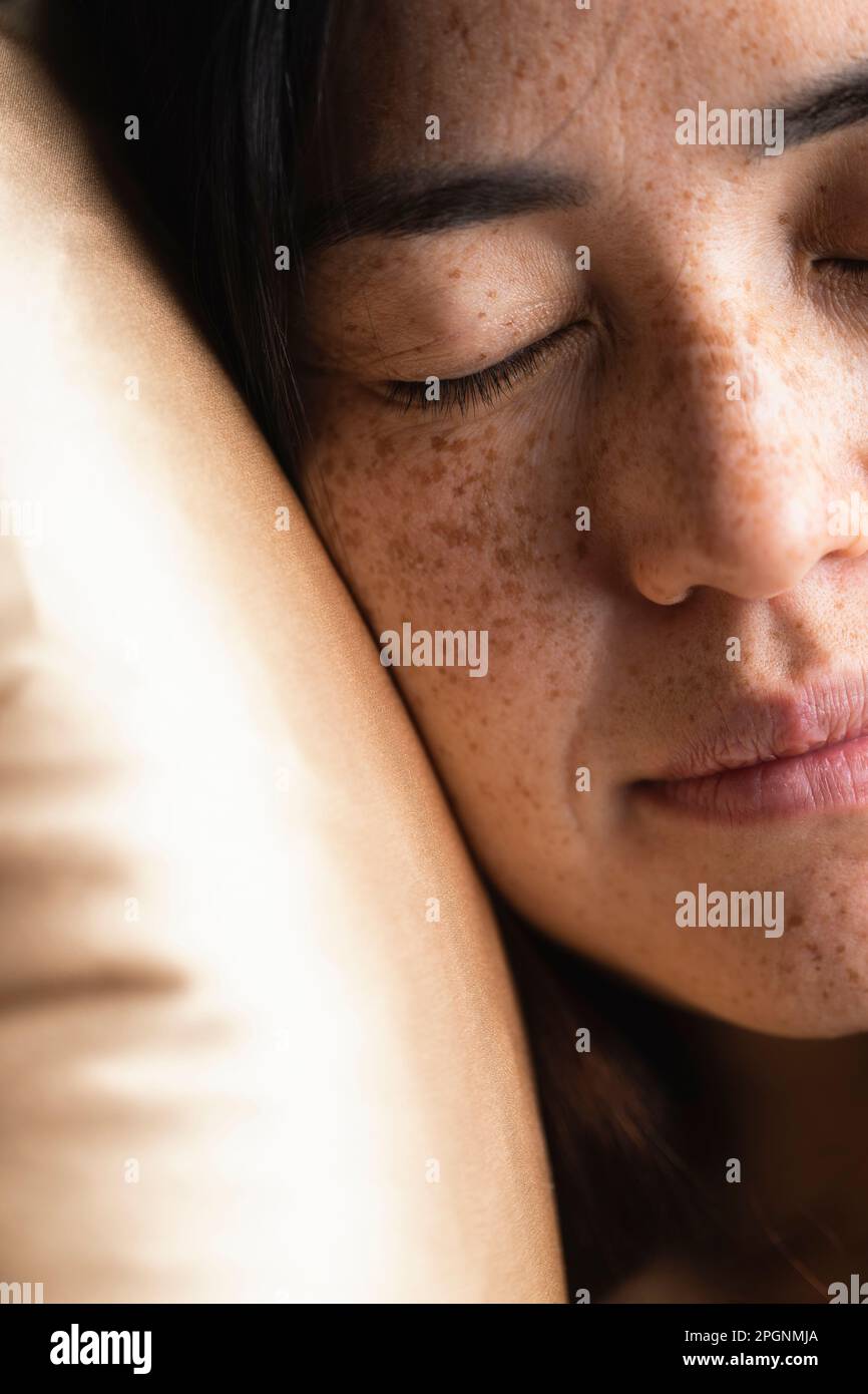 Woman resting on pillow hi-res stock photography and images - Alamy