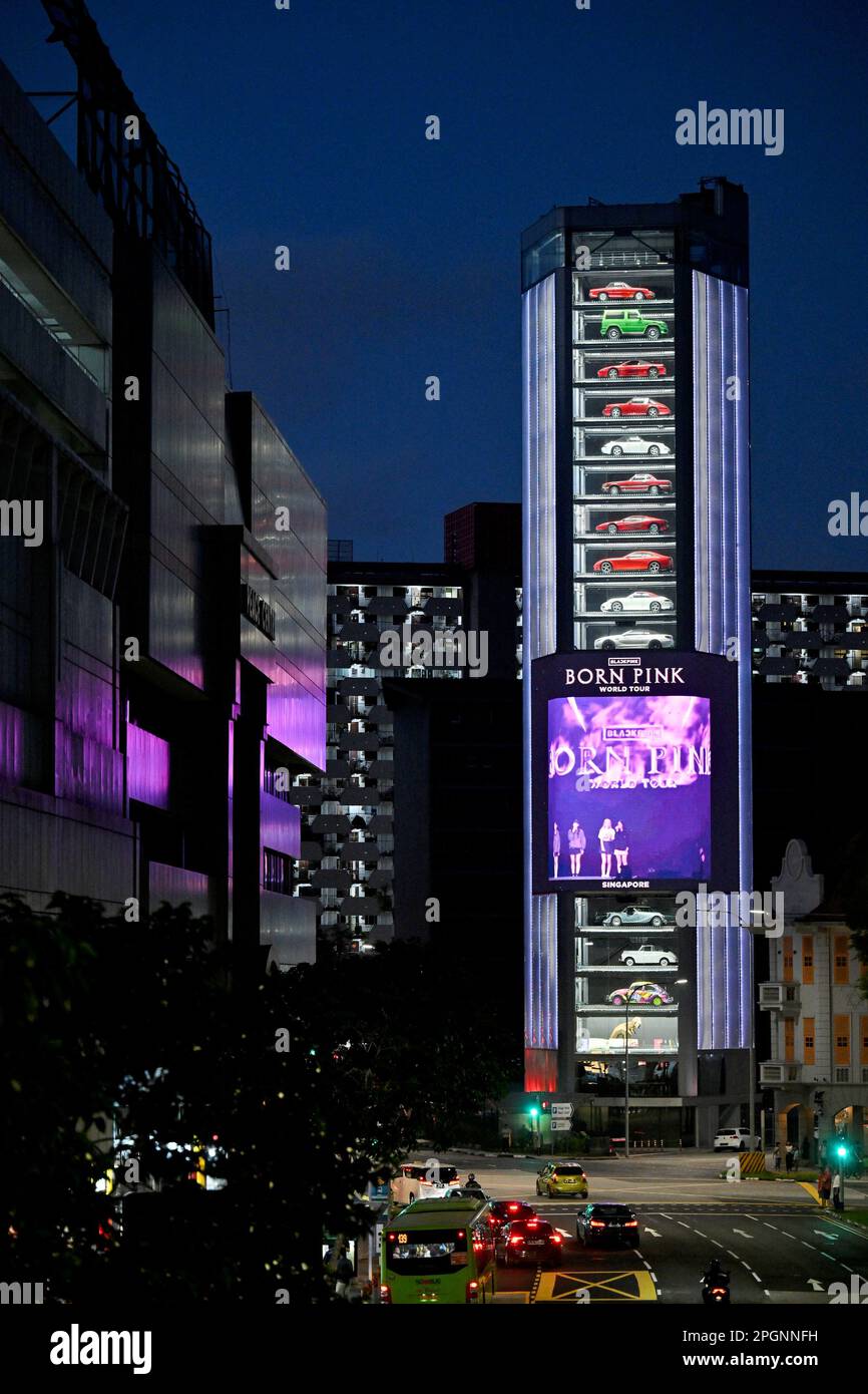 The Ten Square car vending machine lights up at dusk in Singapore March
