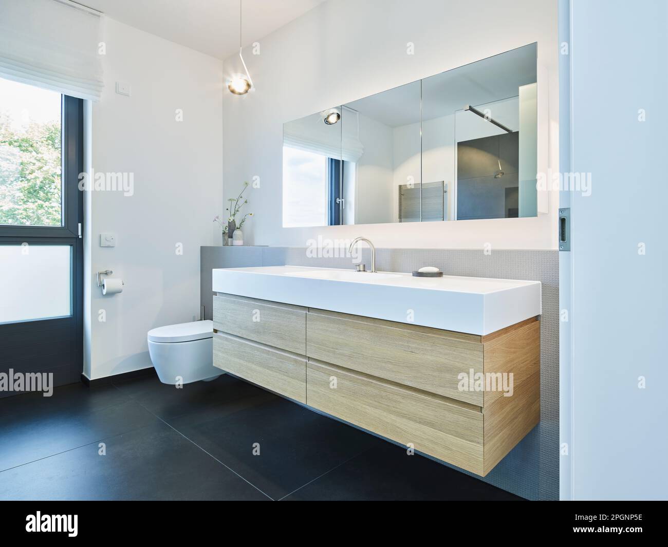 Modern bathroom set up in apartment Stock Photo Alamy