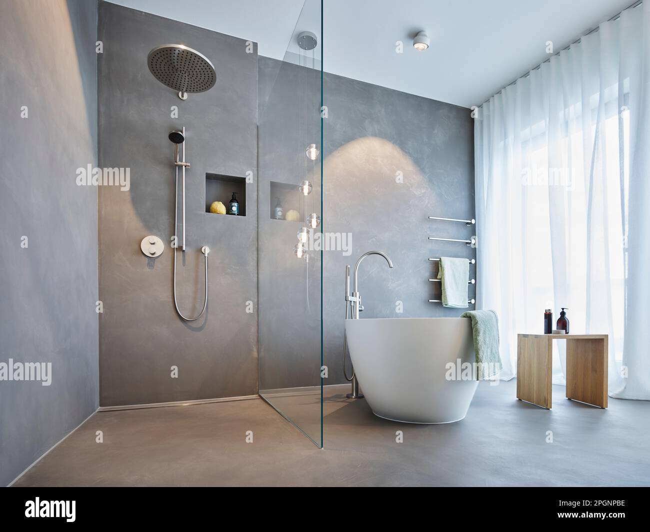 Bath tub and shower area in modern apartment Stock Photo Alamy