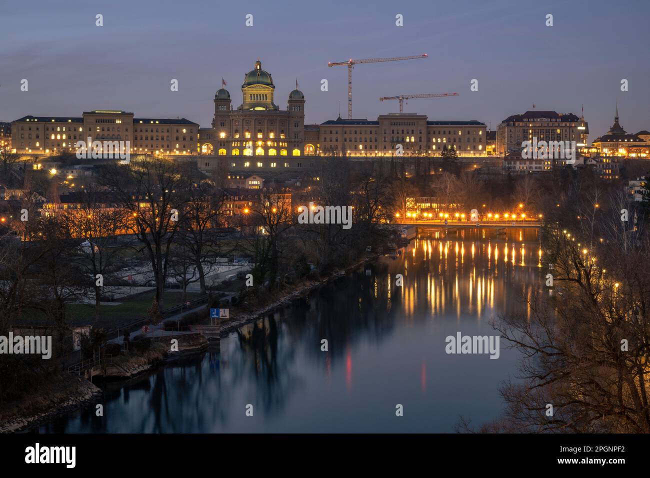 Switzerland, Bern Canton, Bern, View from Monbijoubrucke to Bundeshaus at dusk Stock Photo