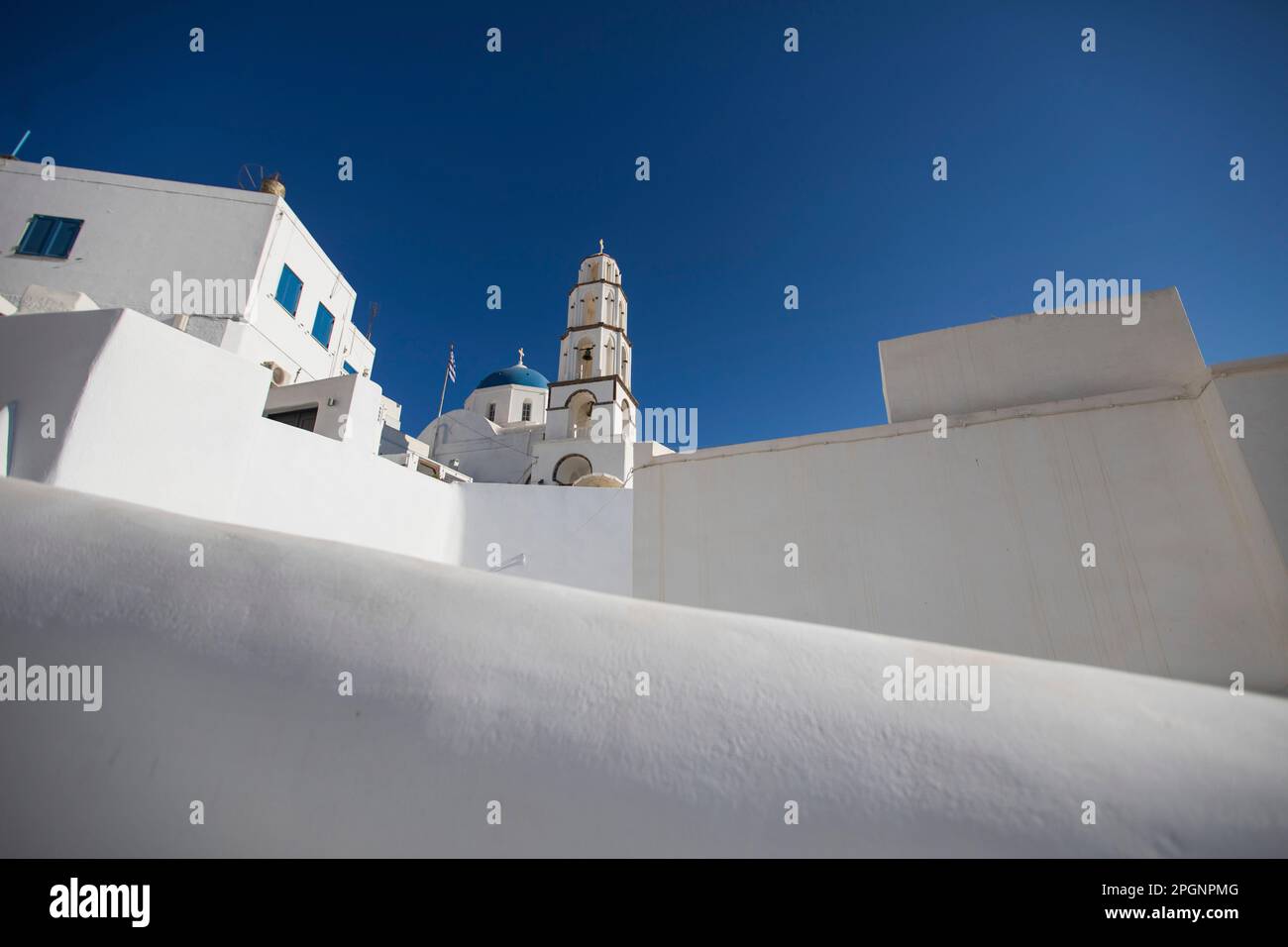 Church with white walls under blue sky Stock Photo - Alamy