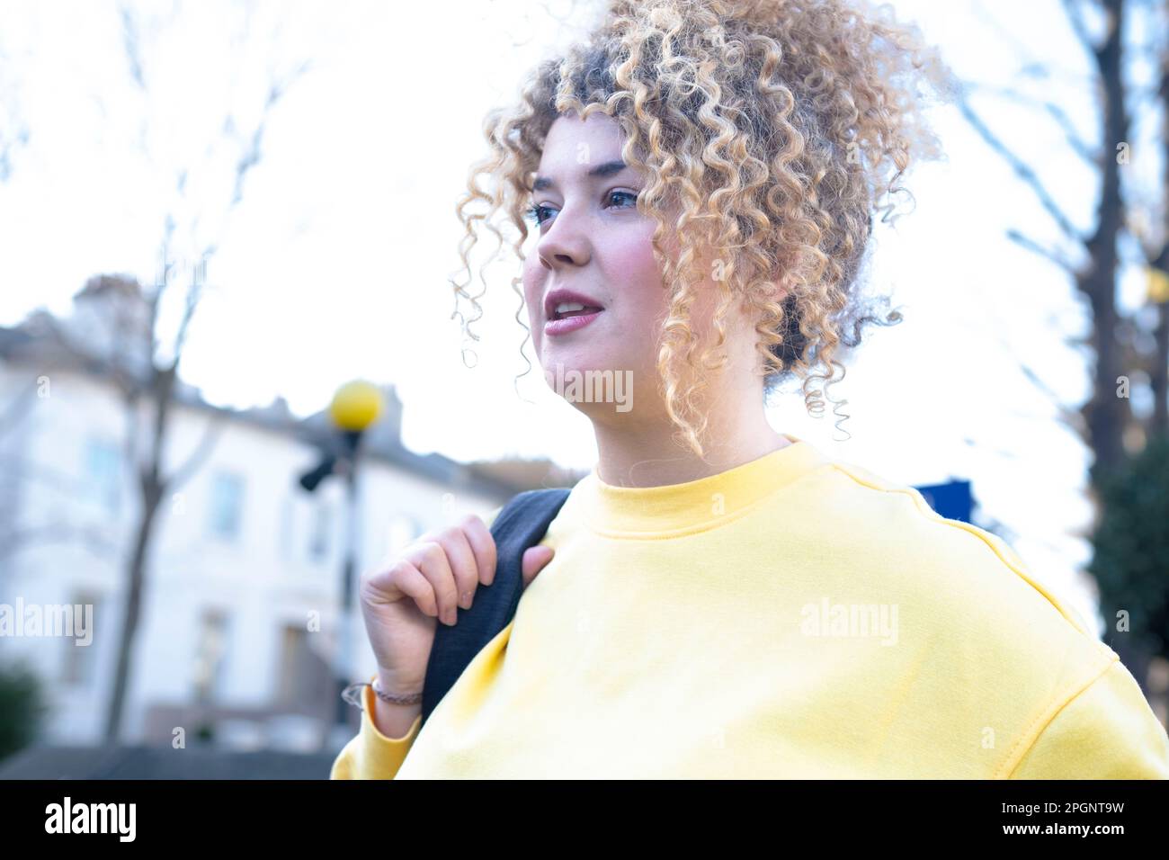 Blond curly hair hi-res stock photography and images - Alamy