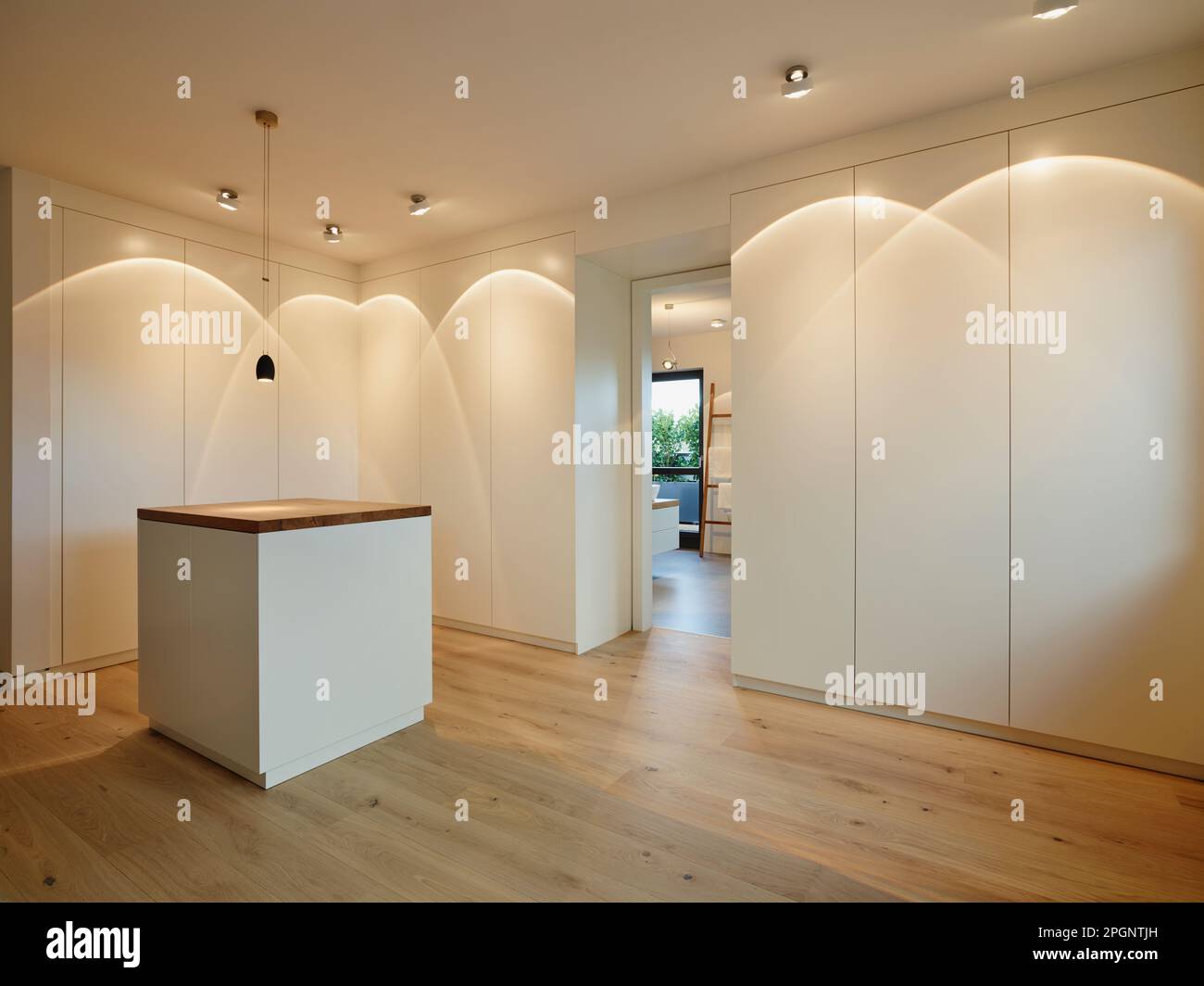 Illuminated dressing room in modern penthouse Stock Photo