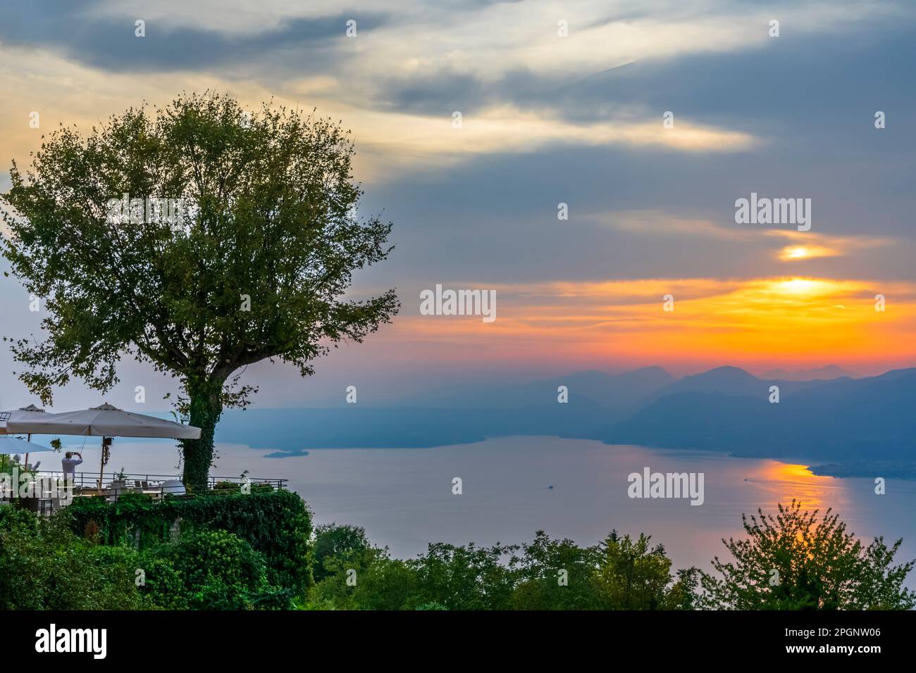 Italy, Veneto, San Zeno di Montagna, Lake Garda at cloudy sunset Stock Photo