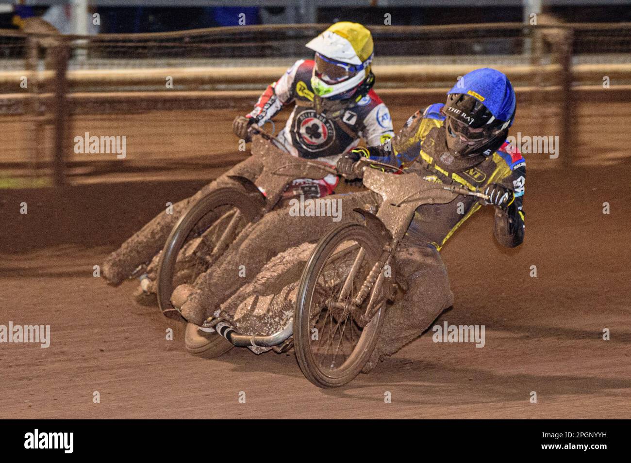 Dan Gilkes (Blue) leads Jake Mulford (Yellow) during the Sheffield Tigers vs Belle Vue Aces meeting in the SGP Premiership at Owlerton Stadium, Sheffield on Thursday 23rd March 2023. (Photo: Ian Charles | MI News) Credit: MI News & Sport /Alamy Live News Stock Photo