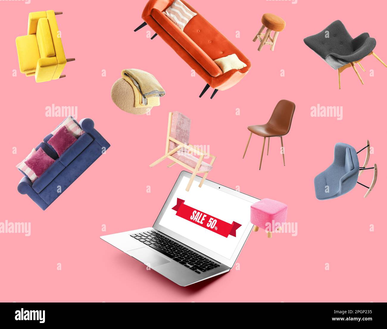 Flying new furniture and laptop with discount on screen against pink background Stock Photo