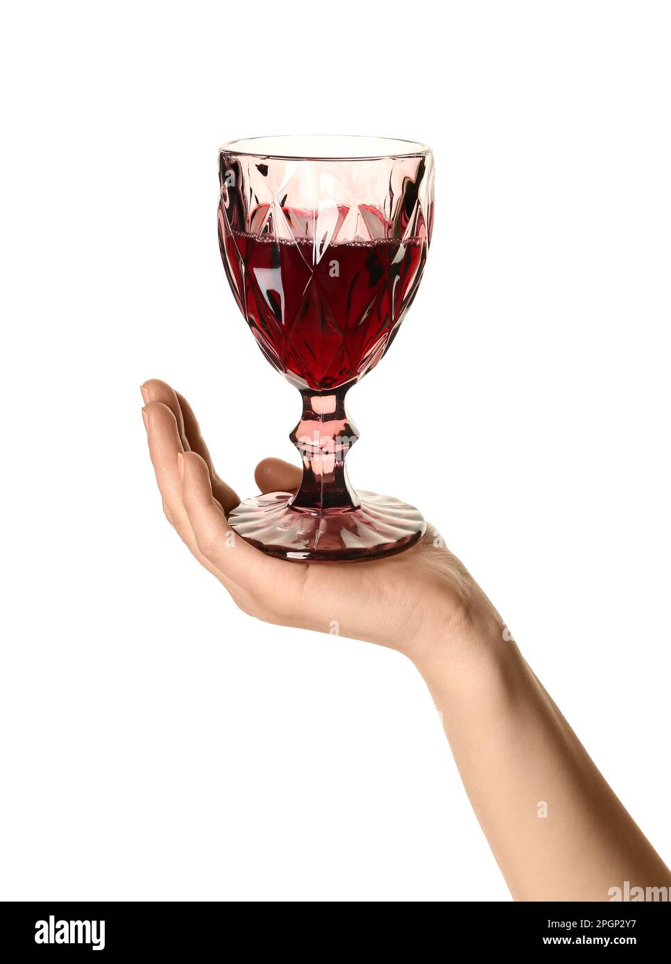 Female hand holding glass of red wine isolated on white background ...