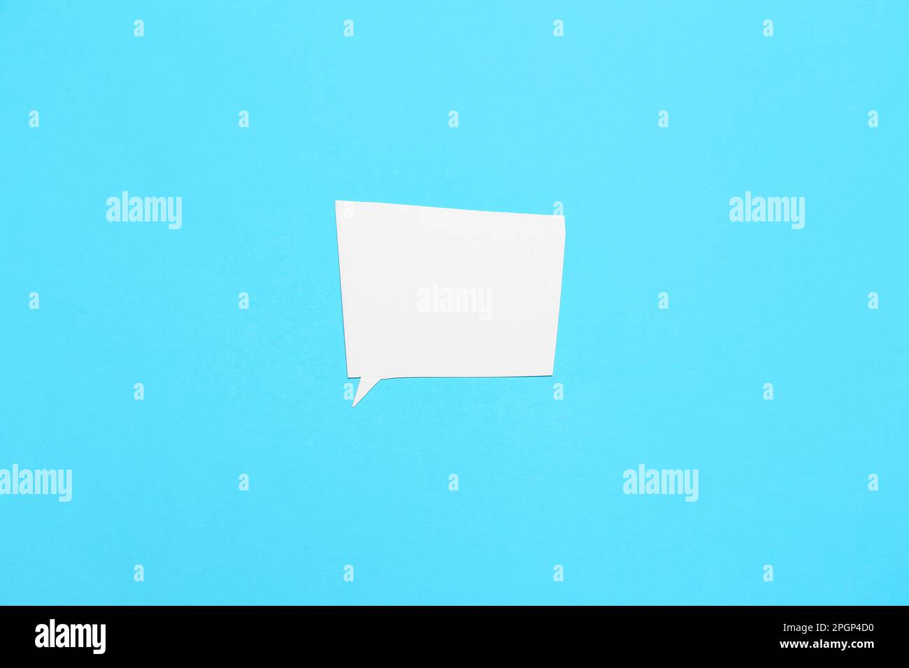 Blank speech bubble on blue background Stock Photo