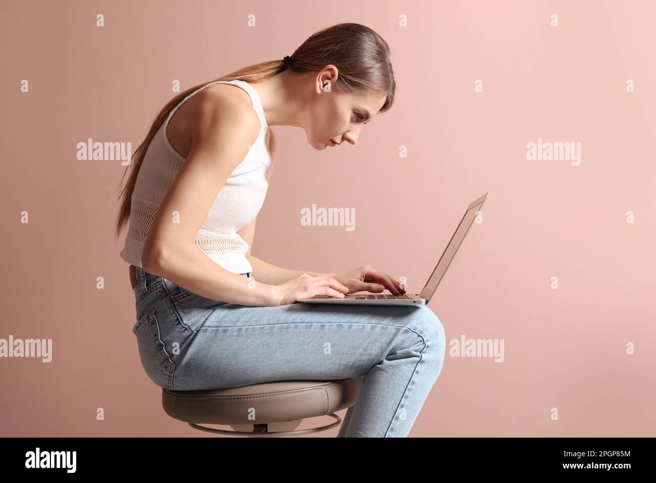 Woman stool back view hi-res stock photography and images - Alamy