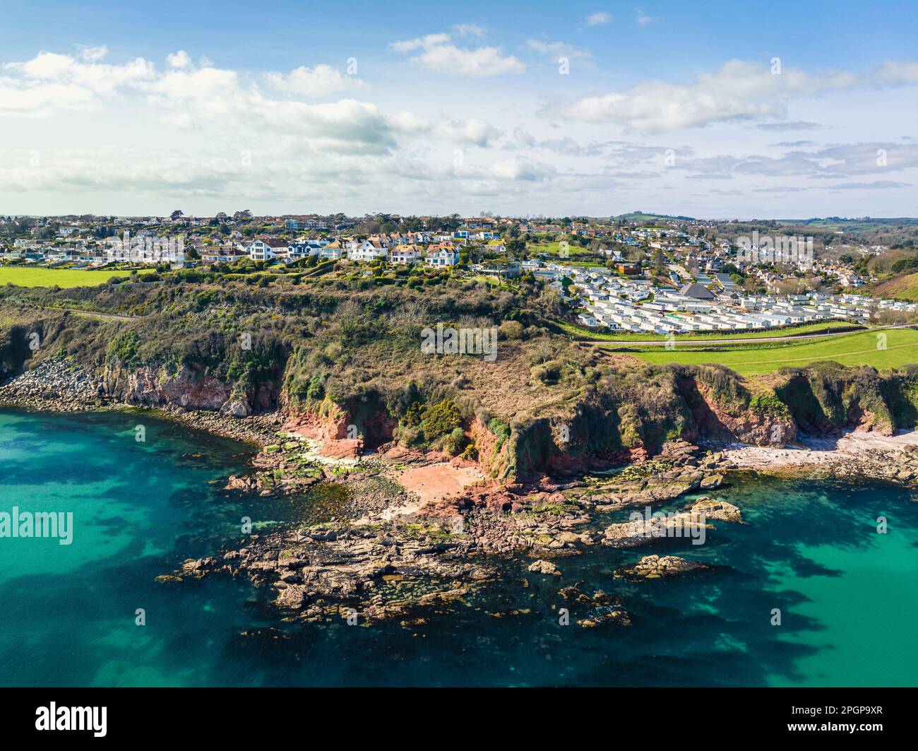 Armchair Cove and Waterside Holiday Park from a drone, Broadsands Beach