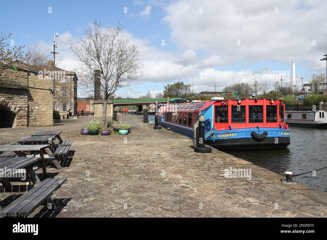 Canal boats moored in Victoria Quays, Sheffield canal basin England. Waterway Stock Photo