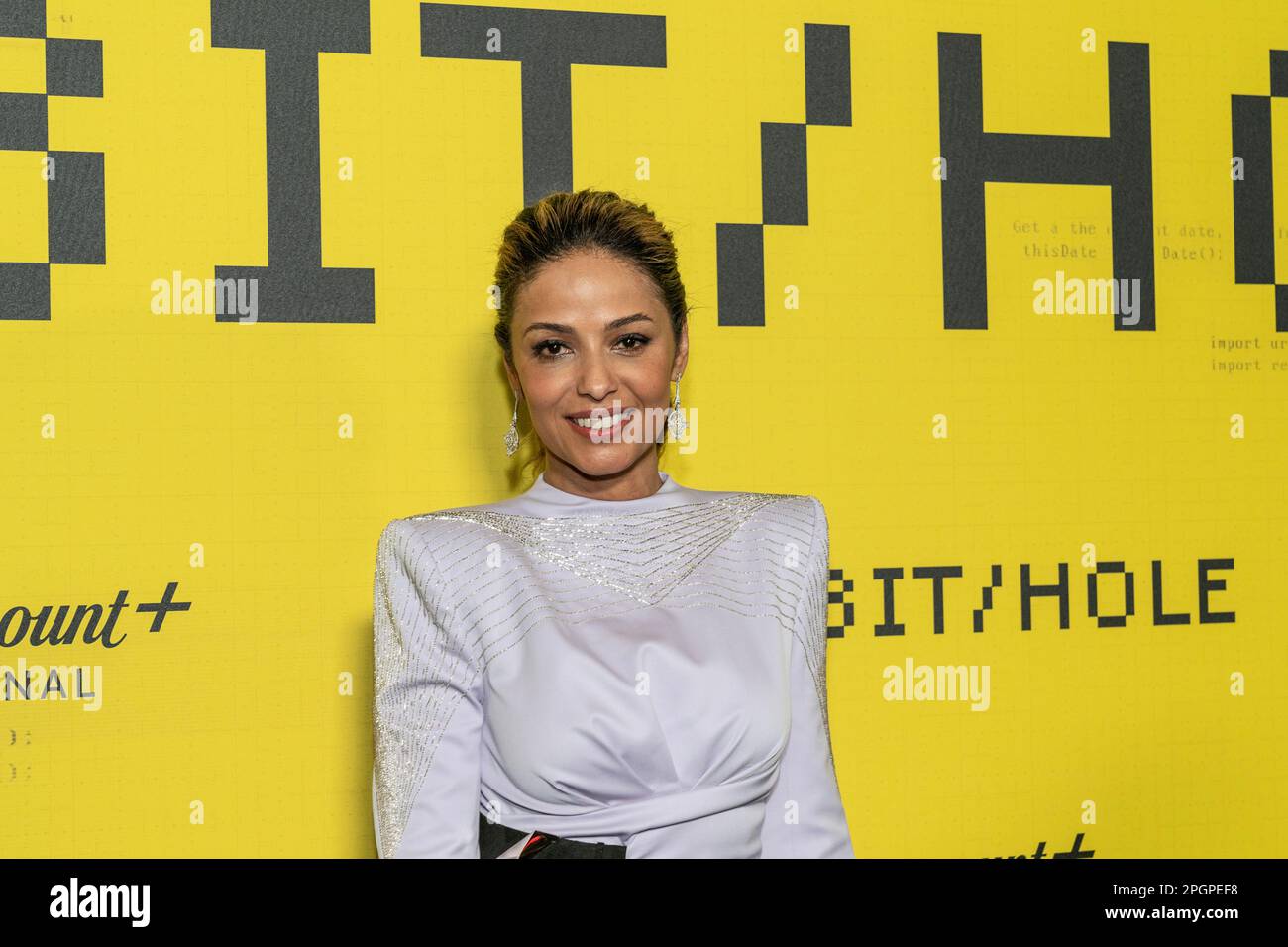 Meta Golding wearing dress by Bahareh Ardakani for ArdAzAei attends Paramount+ special