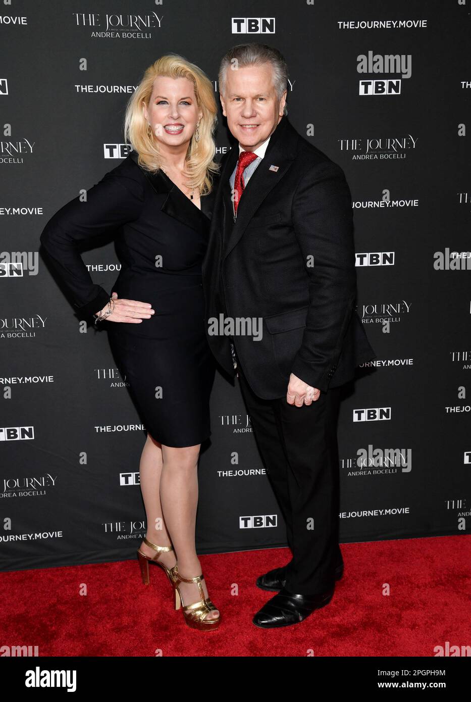 Rita Cosby, left, and husband Tomaczek Bednarek attend the premiere