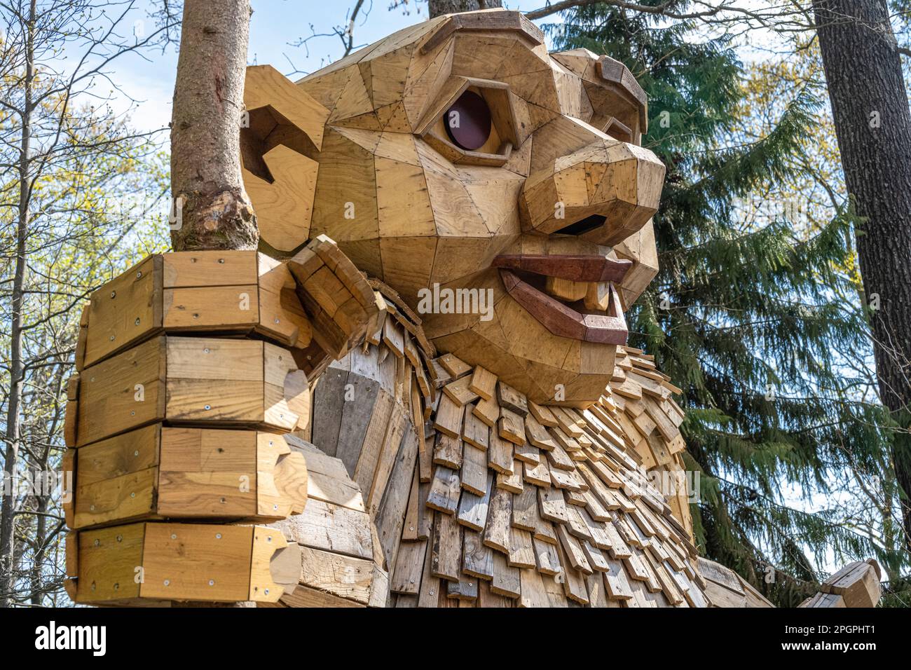 Ronja Redeye, a huge wooden troll sculpture by Danish artist Thomas Dambo, greets visitors to the Atlanta Botanical Garden in Atlanta, Georgia. (USA) Stock Photo