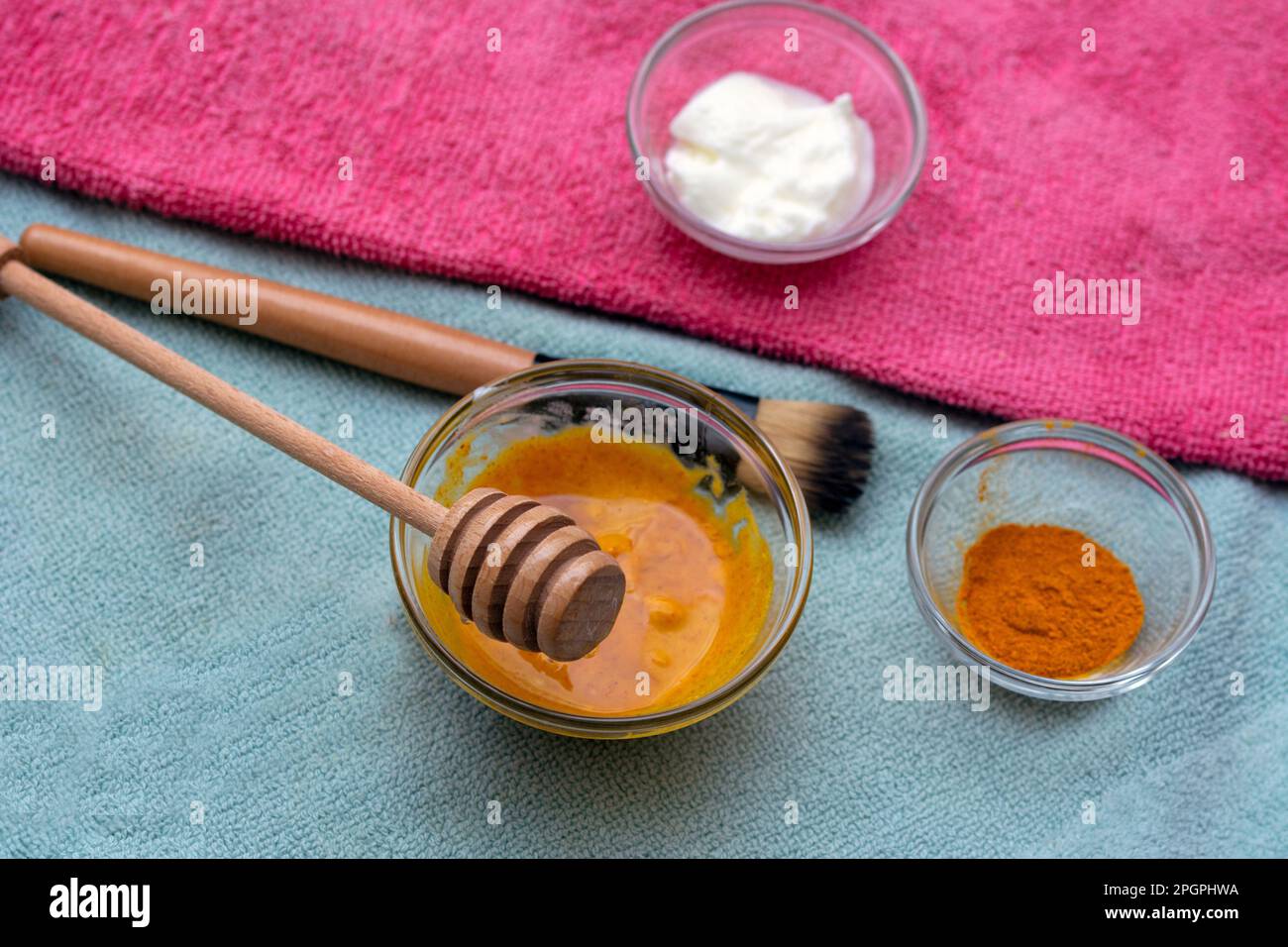 Homemade face mask with turmeric, yoghurt, coconut oil and honey for