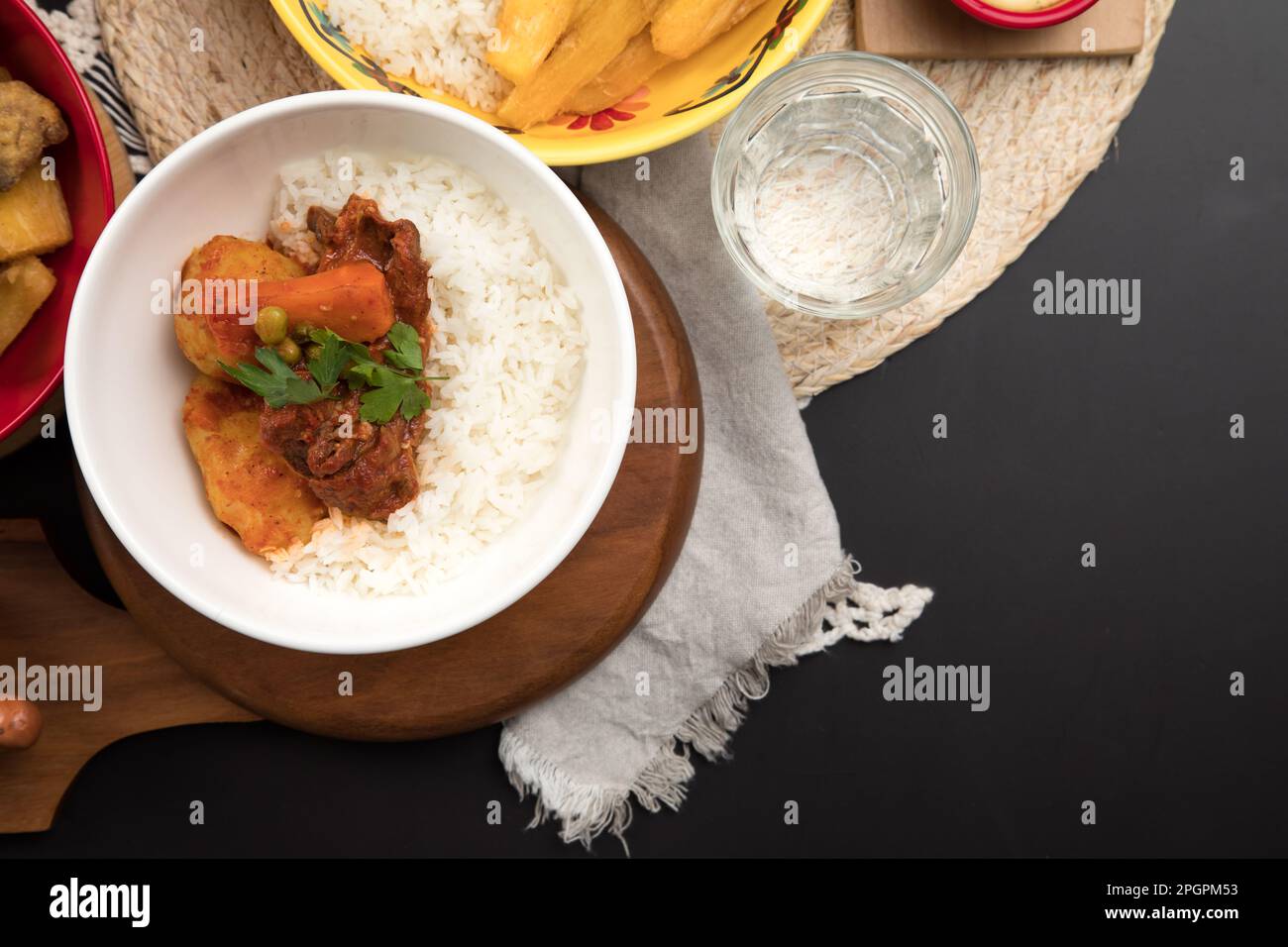 Beef stew estofado Peruvian food buffet table Assorted dishes gourmet