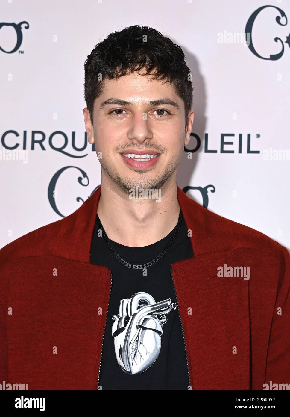 Asher Levine arriving at the Cirque du Soleil “CORETO” red carpet