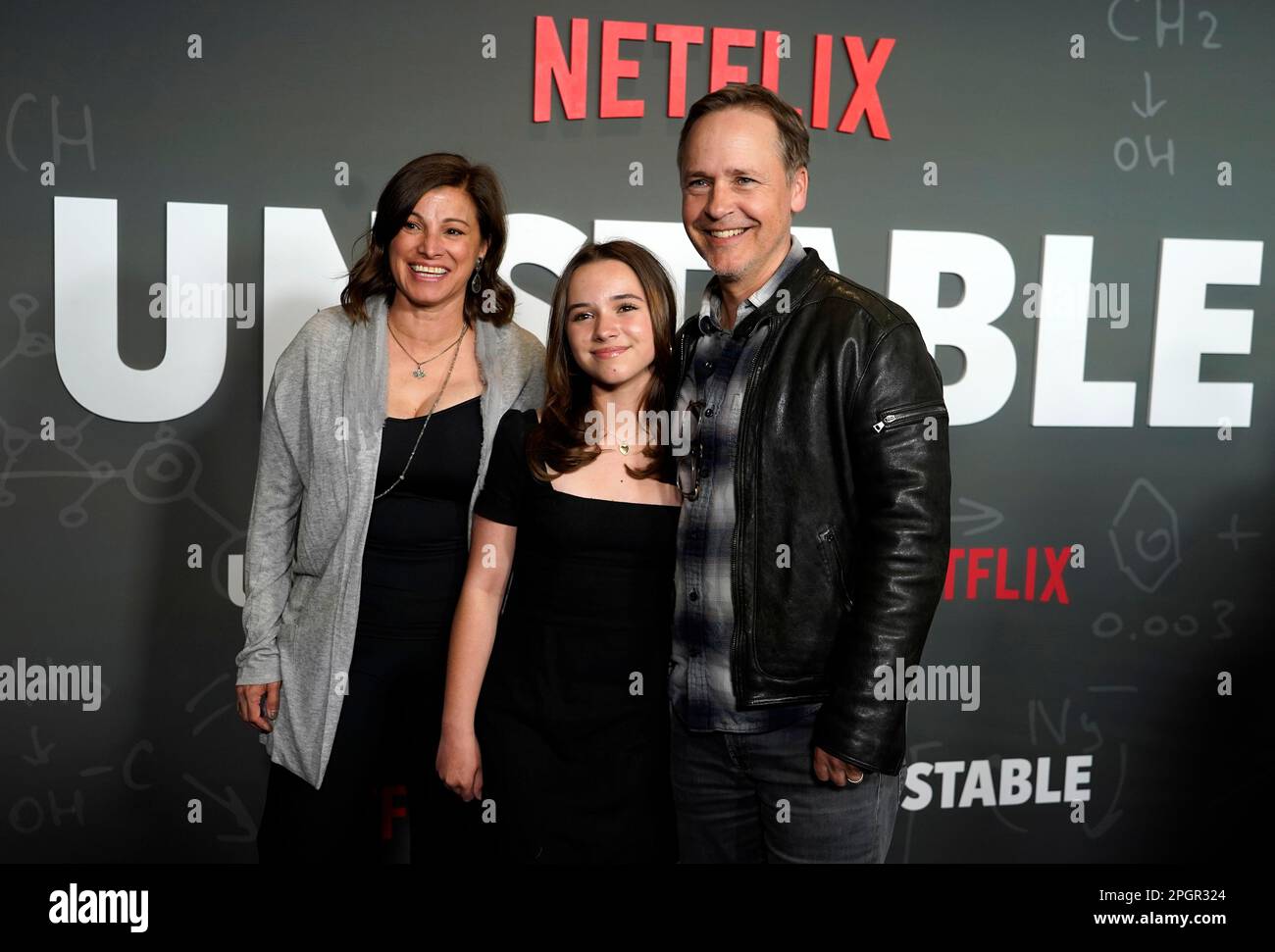 Chad Lowe, right, poses with his wife Kim Painter and their daughter
