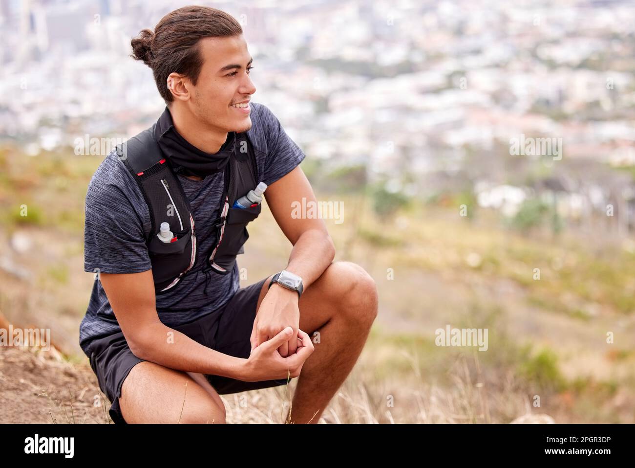 Hiking, fitness and man thinking and rest on a mountain after trekking