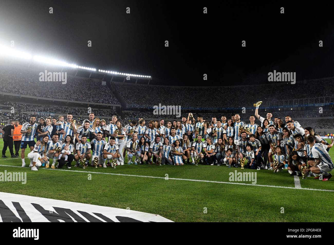 ARGENTINA, Buenos Aires: 23 march 2023: Lionel Messi of Argentina and his teammates, staff, family and friends pose for group photo and celebrates with FIFA World cup trophy during the friendly international match between Argentina and Panama at Estadio Mas Monumental Antonio Vespucio Liberti. photo Diego Halisz/SFSI Stock Photo