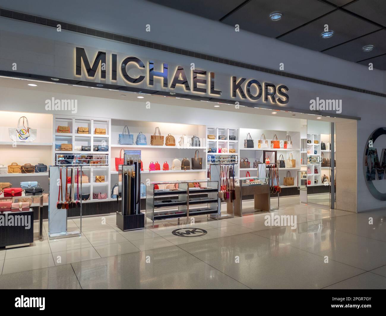 Queens, New York - Feb 6, 2023: Landscape Close-up View of Michael Kors Store inside JFK Airport. Stock Photo