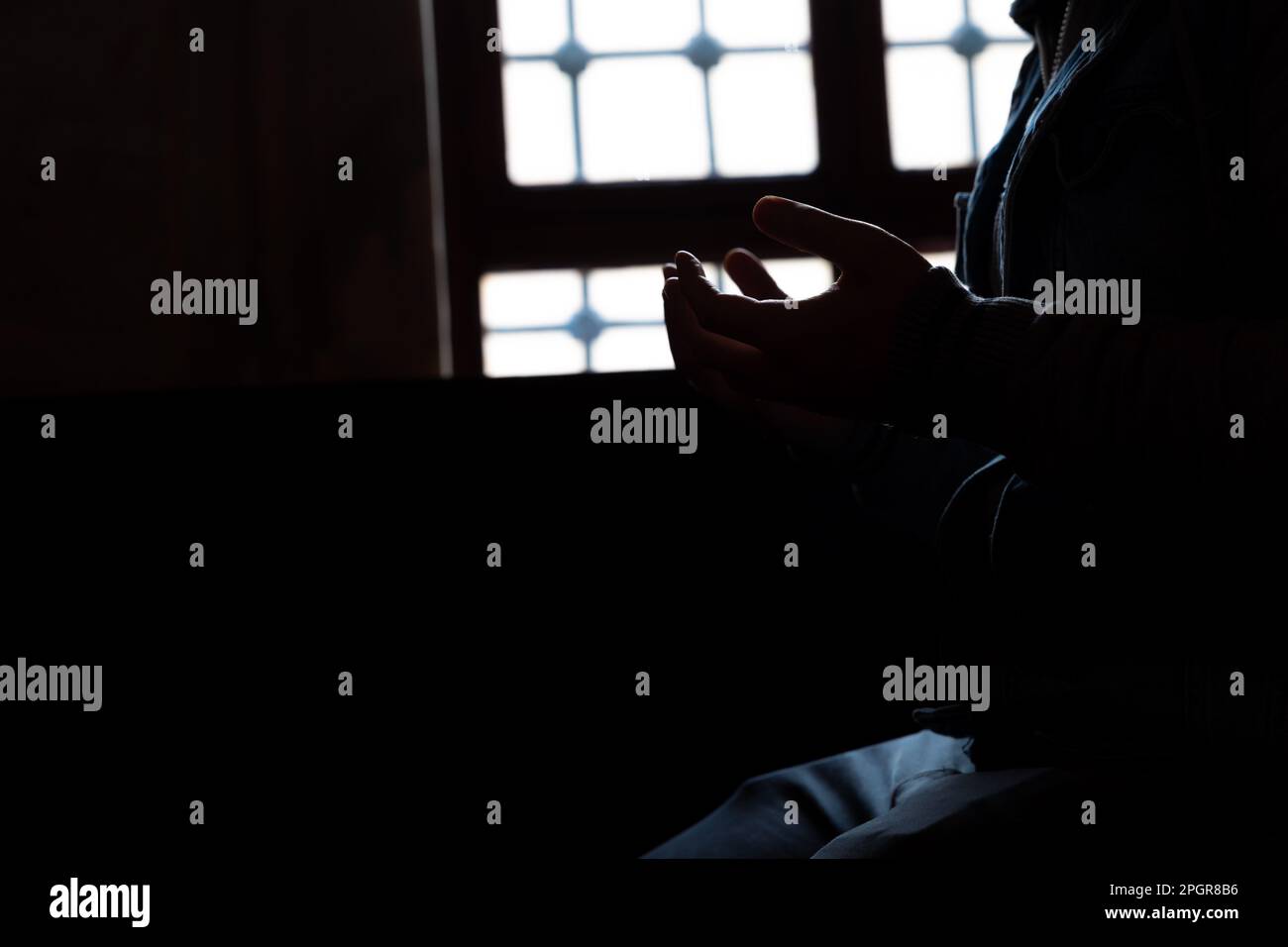 Image silhouette man praying mosque hi-res stock photography and images ...