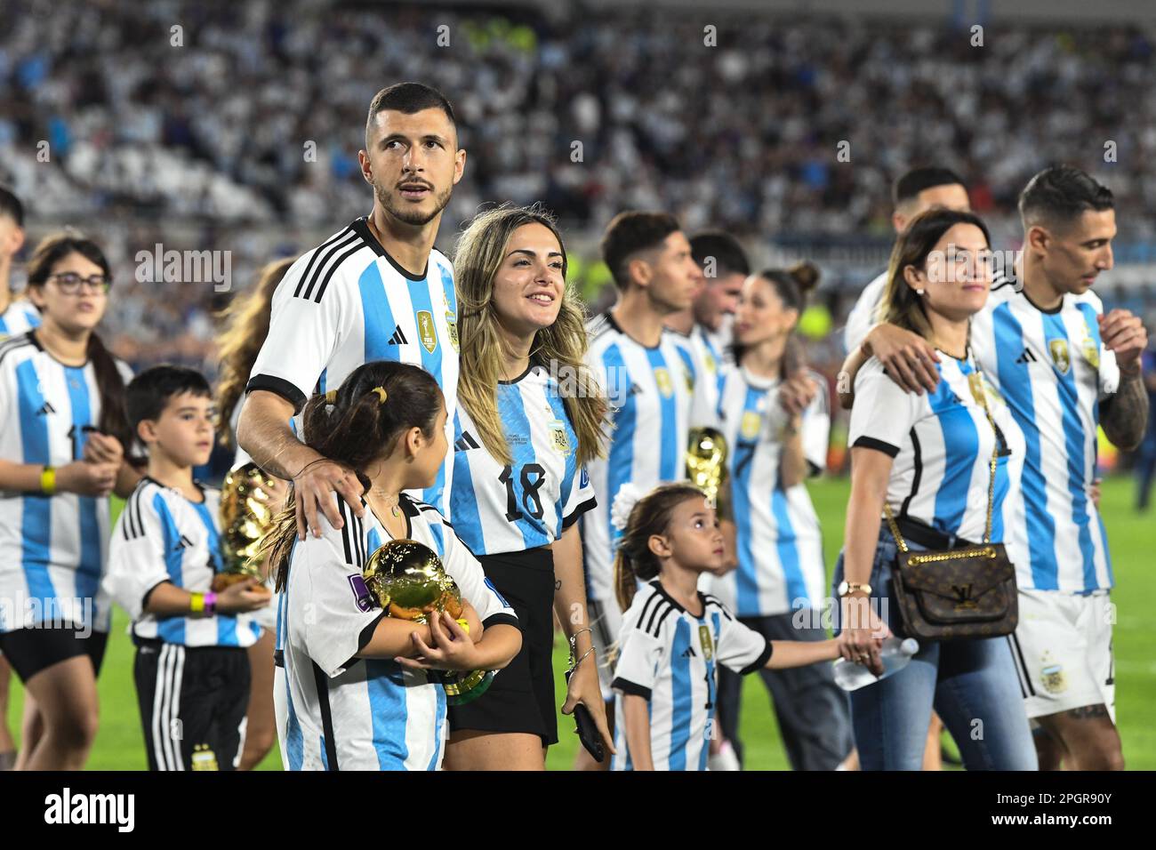 ARGENTINA, Buenos Aires: 23 march 2023: Guido Rodriguez of Argentina celebrates with his wife and childrens and FIFA World cup trophy during the friendly international match between Argentina and Panama at Estadio Mas Monumental Antonio Vespucio Liberti. photo Diego Halisz/SFSI Stock Photo
