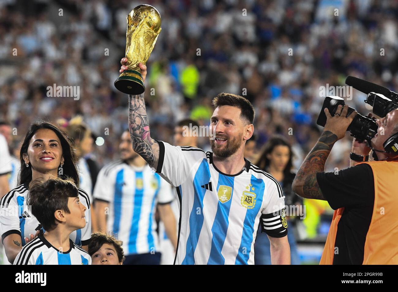 ARGENTINA, Buenos Aires: 23 march 2023: Lionel Messi of Argentina celebrates with his family and FIFA World cup trophy during the friendly international match between Argentina and Panama at Estadio Mas Monumental Antonio Vespucio Liberti. photo Diego Halisz/SFSI Stock Photo