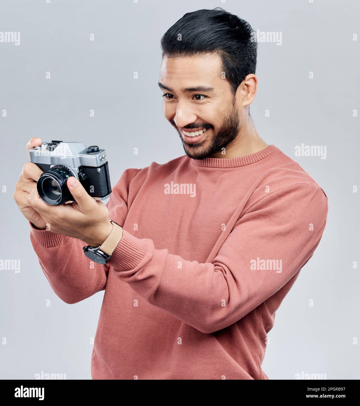 Camera, photography and happy with asian man in studio for photoshoot,  satisfaction and creative. Vintage, photographer and production with male  on Stock Photo - Alamy