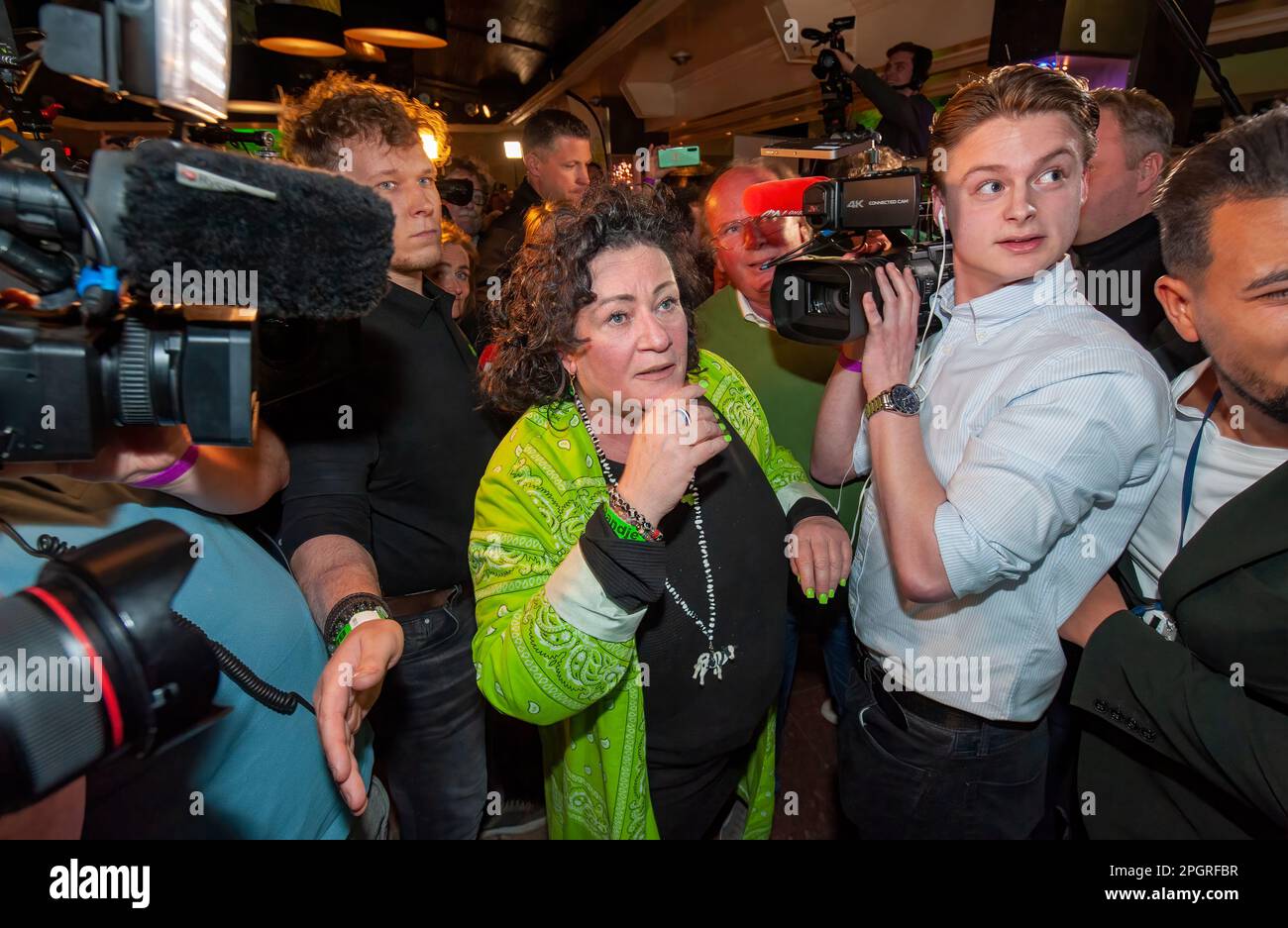 BATHMEN, THE NETHERLANDS - MAR 15, 2023: Politician Caroline van der Plas is curious to read the results on a TV screen of the provincial elections in Stock Photo