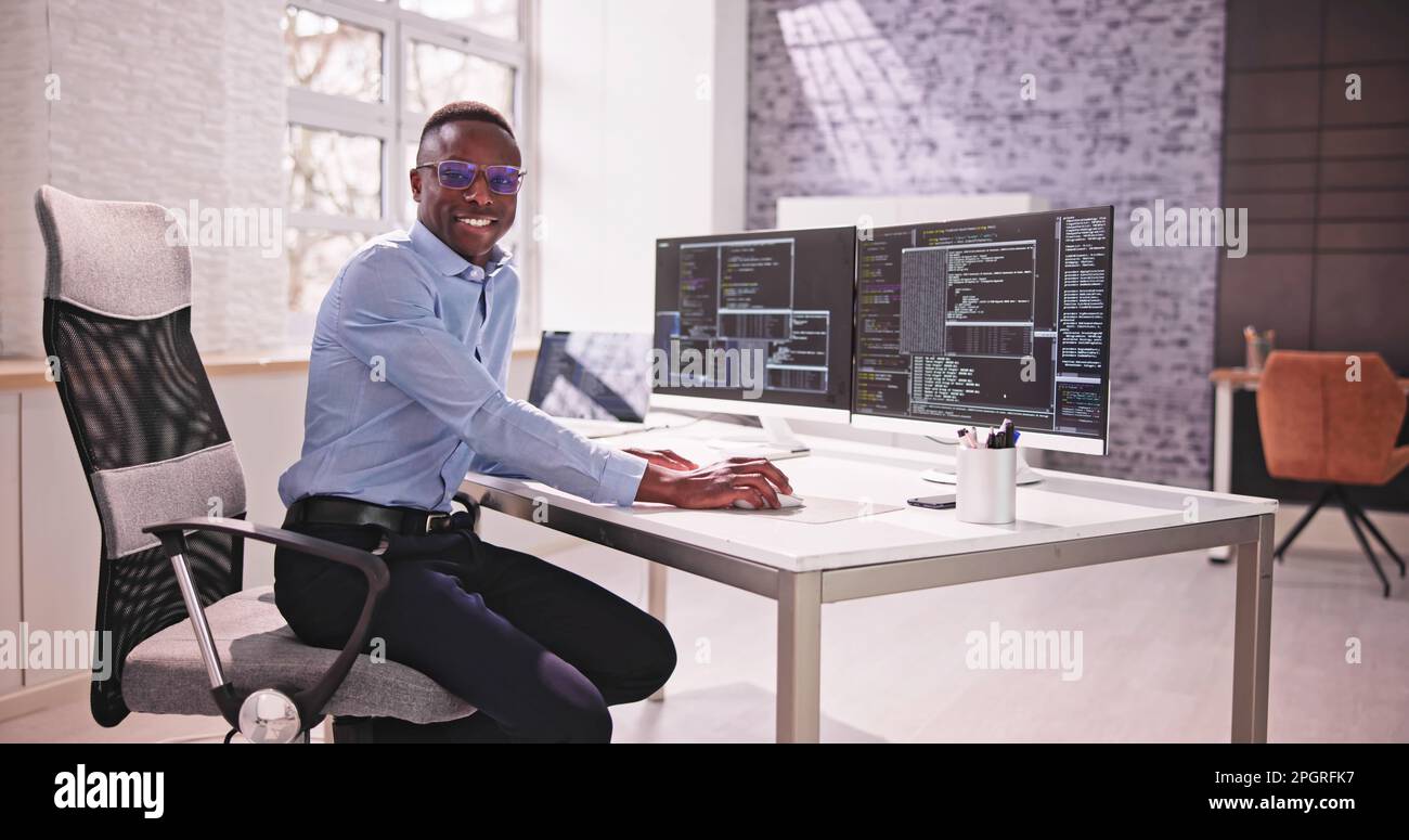 Programmer Coding Classes. Web Developer Coder In Office Stock Photo