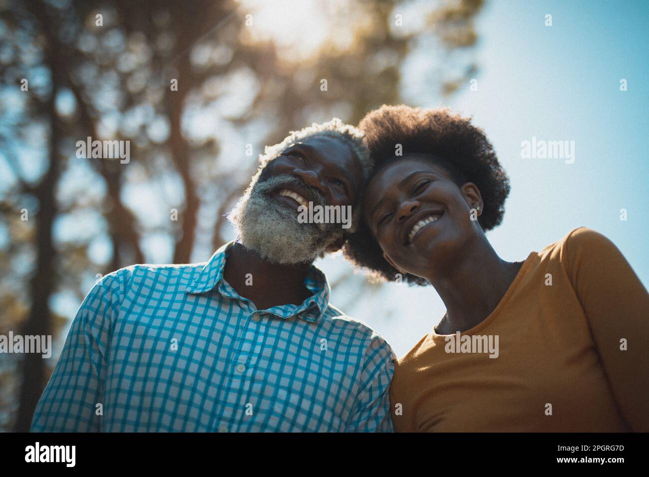 Portrait of african american senior couple looking ahead and smiling Stock Photo