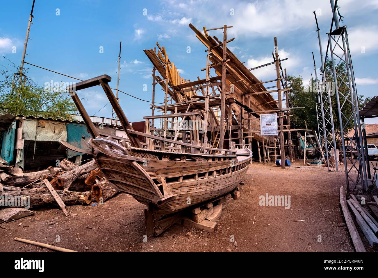 View of the giant traditional dhow Al Ghanja in the shipbuilding factory of Sur, Ash Sharqiyah, Oman Stock Photo