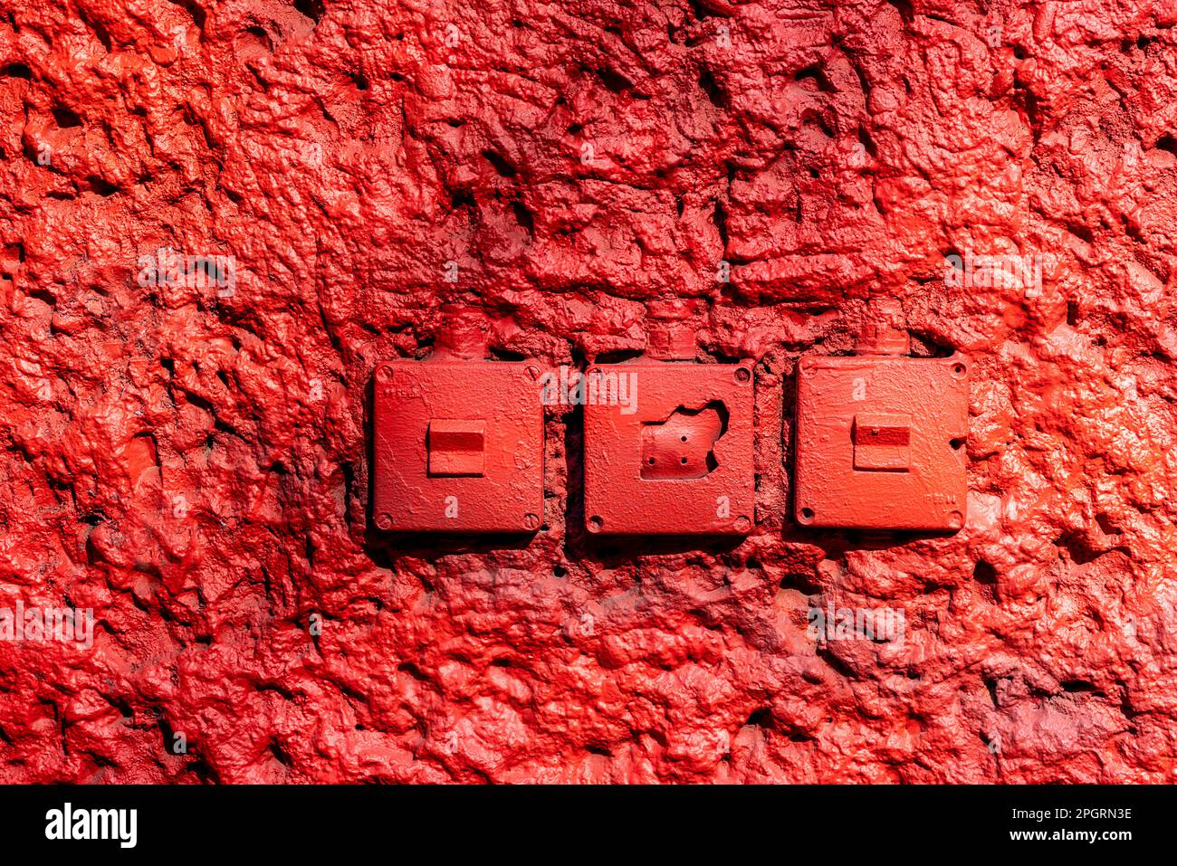 Red Wall With Old Light Switches, RAW Area, Former