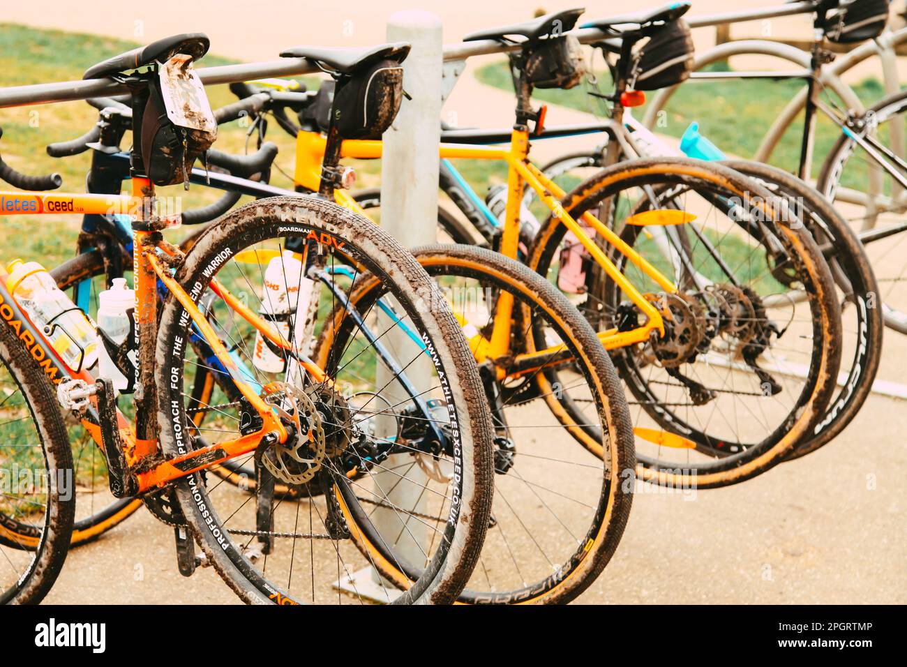 Line of professional cycling bicycles in bike rack at Box Hill, Surrey