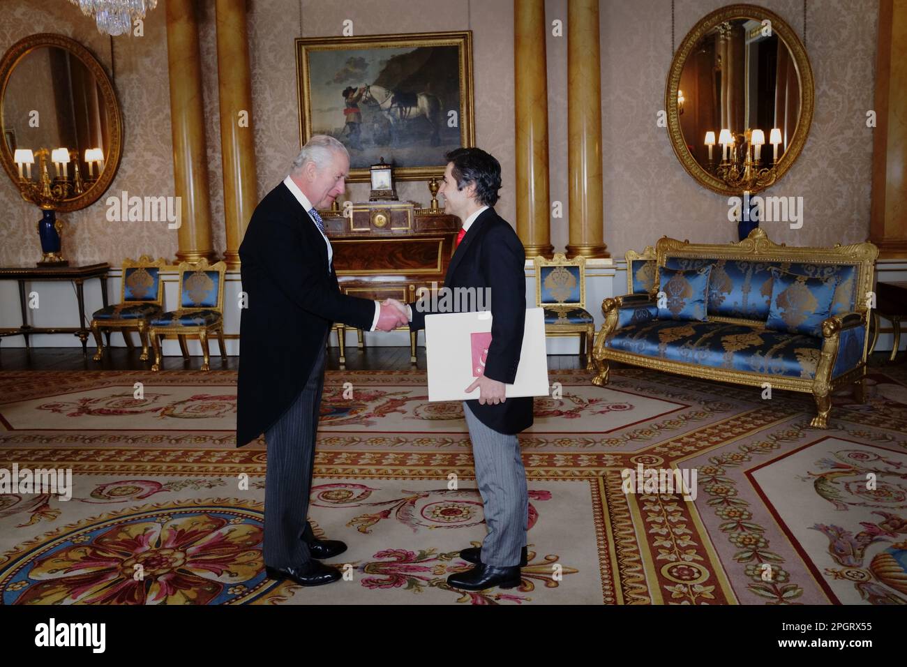 RETRANSMITTING CORRECTING NAME OF AMBASSADOR King Charles III receives the Ambassador of Turkey, Koray Ertas, as he presents his credentials during a private audience at Buckingham Palace, London. Picture date: Thursday March 23, 2023. Stock Photo